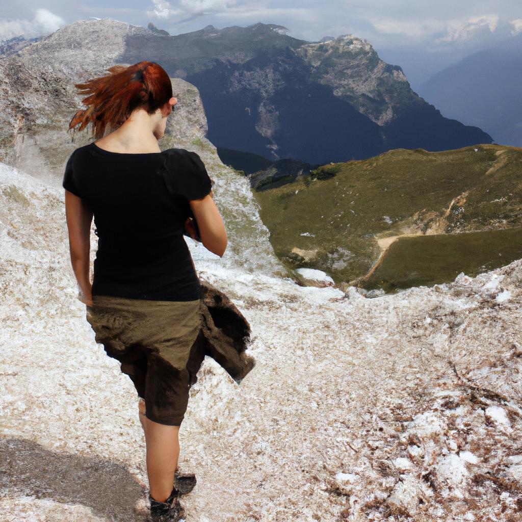Woman hiking in scenic landscape