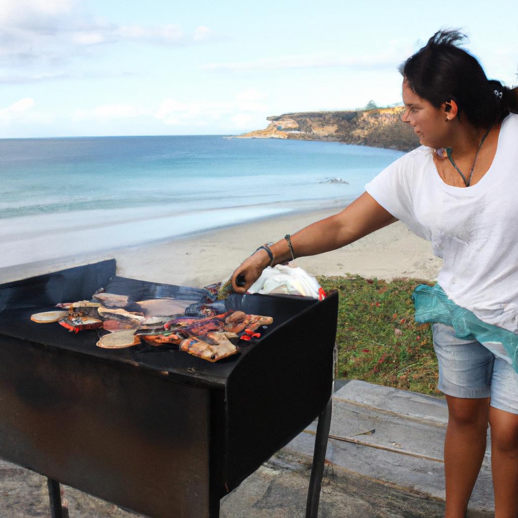 Woman grilling food by beach