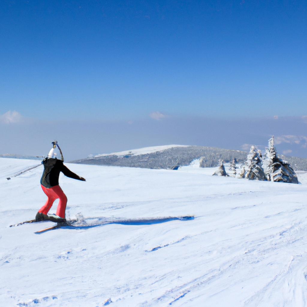 Person skiing in snowy mountains